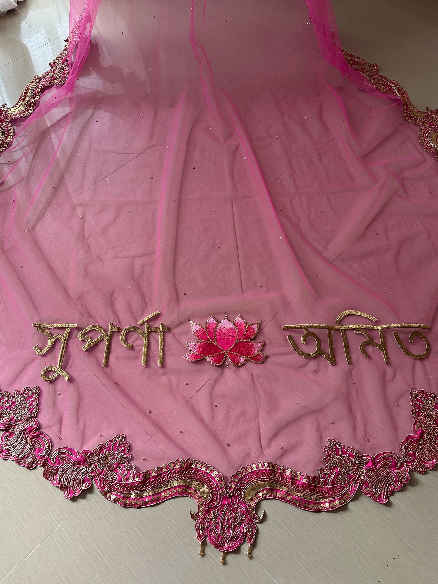Padmavati: A Custom pink Bridal Veil with Embroidered Border & Lotus Personalisation