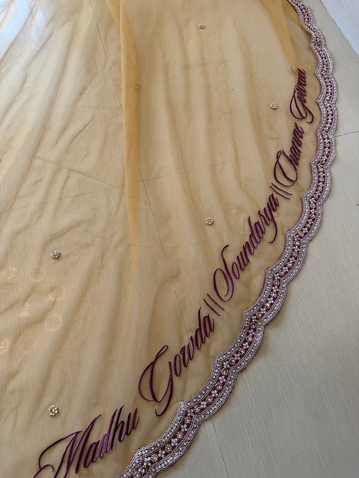 Ancestral Blessings : A Gold Tule veil with multiple personalisations.
