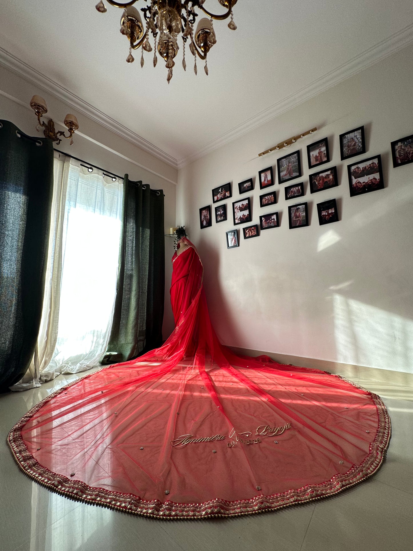 Agni : A Sabyasachi inspired border work with couple's name on cathedral length veil