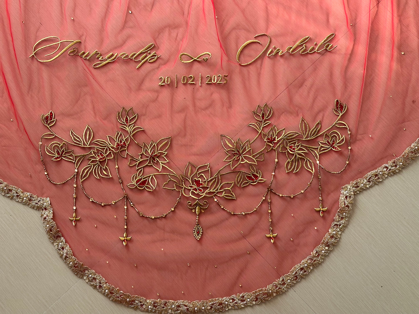 Crimson Bloom : Tri Petal-Cut Cathedral length with Floral embroidery on trail