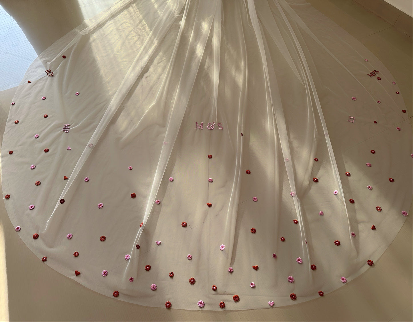 Enchanted : The jewelled Ivory Draped Veil with resin floral hair accessories and floral embroidery