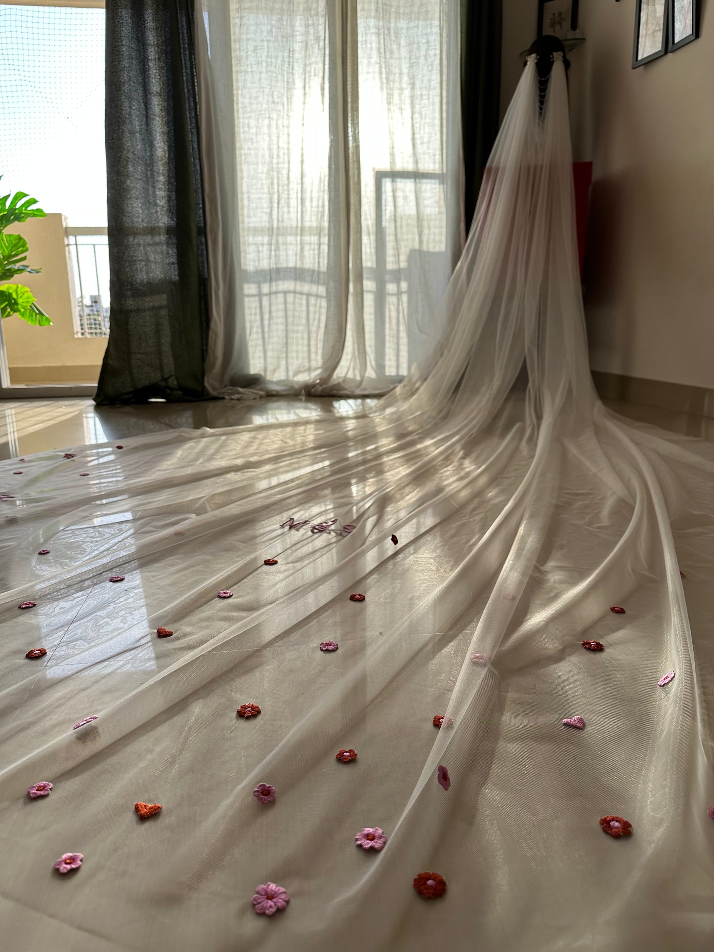Enchanted : The jewelled Ivory Draped Veil with resin floral hair accessories and floral embroidery