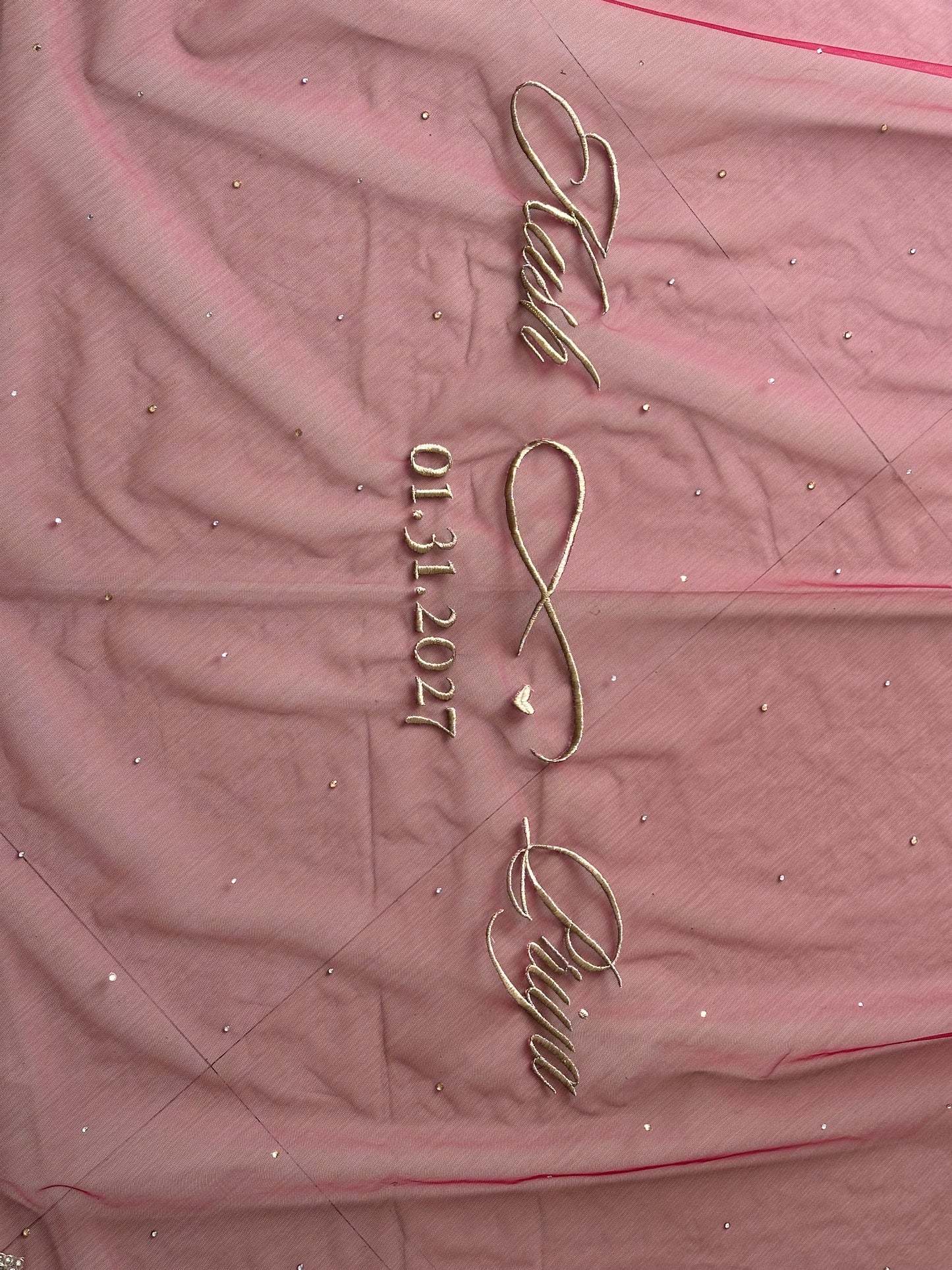 Ishq : A dark maroon veil with scalloped border and personalised quote and couple’s name