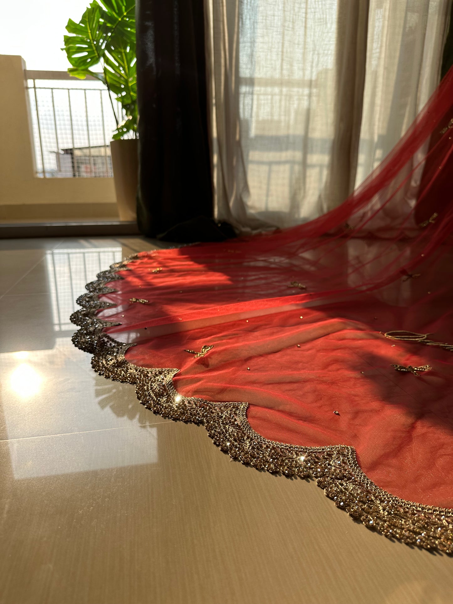 Enchanted Wings : A Red Bridal Veil with Stone-Studded Butterflies