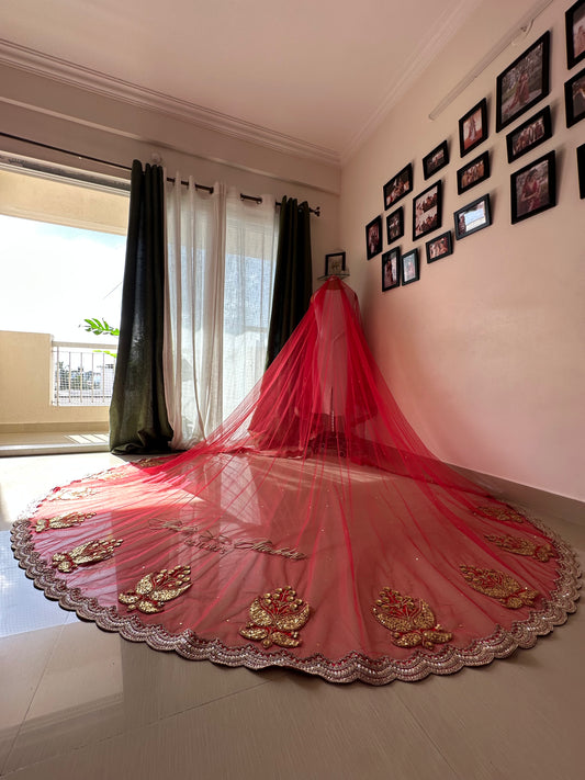 Ruhani – A Sabyasachi-Inspired Red Bridal Veil with Gold Sequins & Handcrafted Motifs