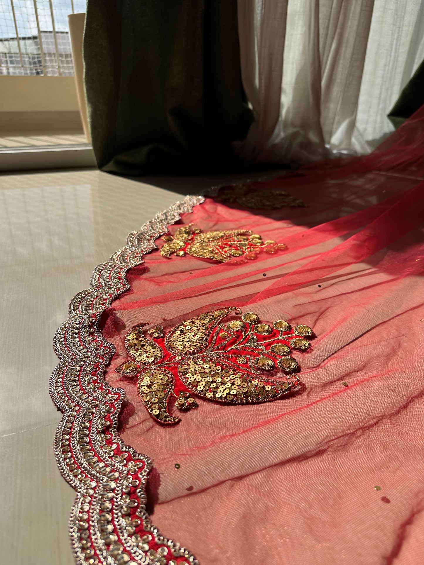 Ruhani – A Sabyasachi-Inspired Red Bridal Veil with Gold Sequins & Handcrafted Motifs