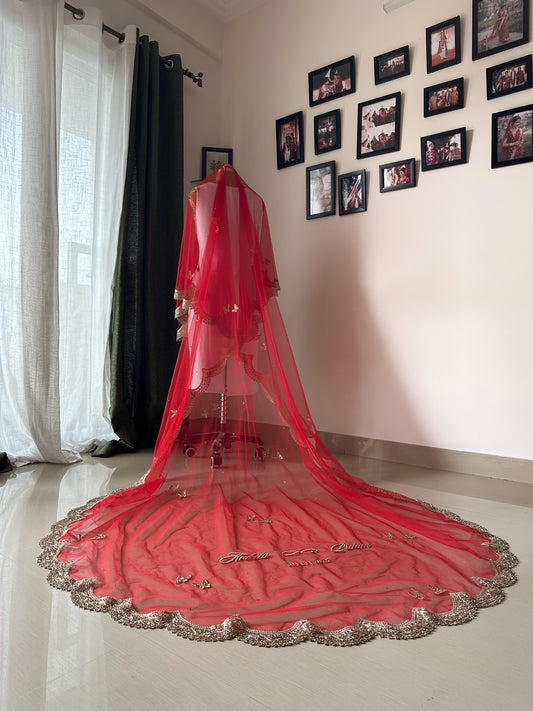 Enchanted Wings : A Red Bridal Veil with Stone-Studded Butterflies