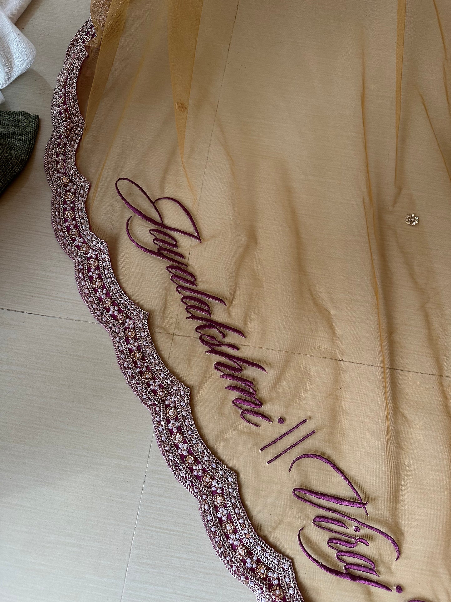 Ancestral Blessings : A Gold Tule veil with multiple personalisations.