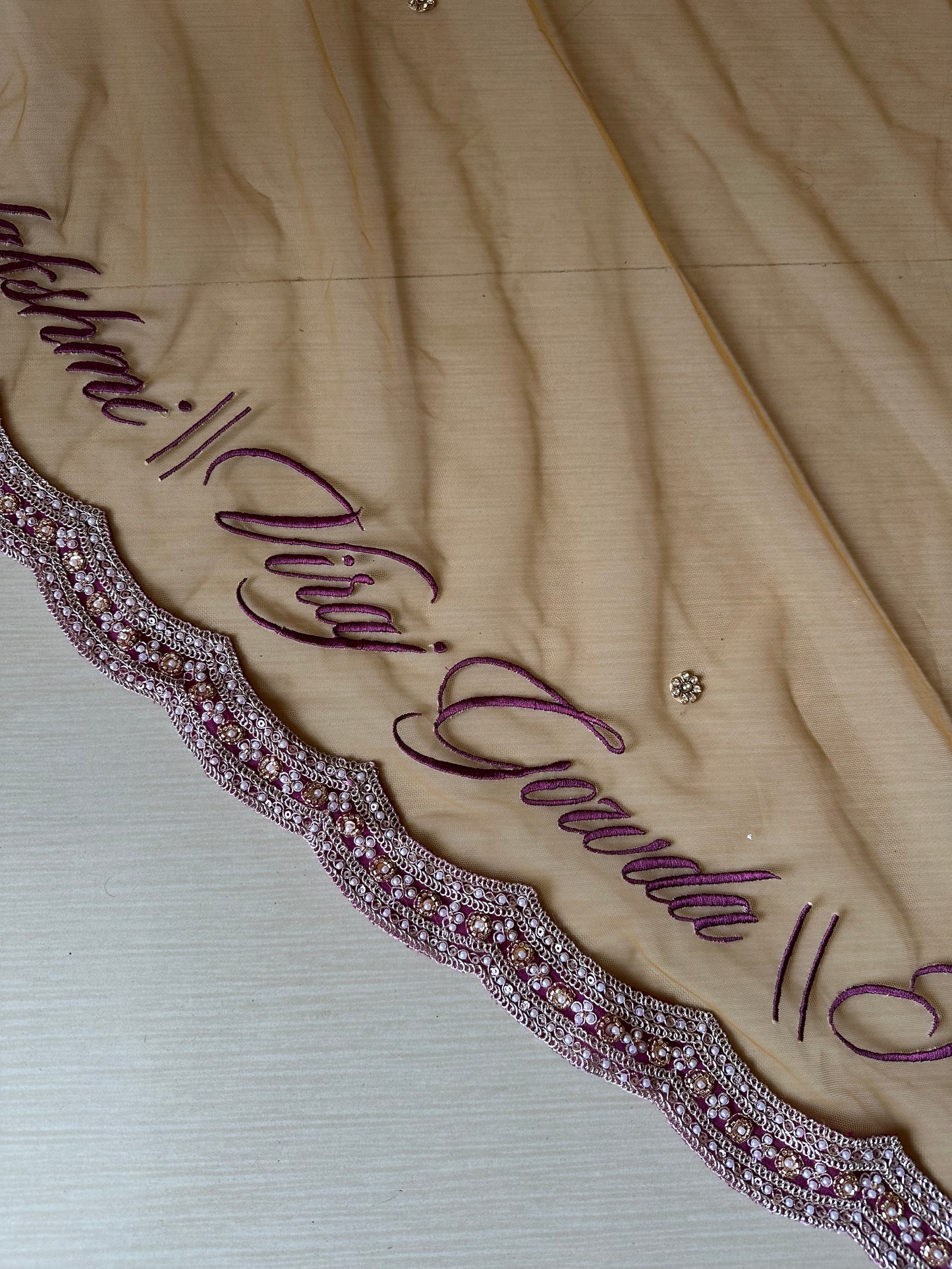 Ancestral Blessings : A Gold Tule veil with multiple personalisations.