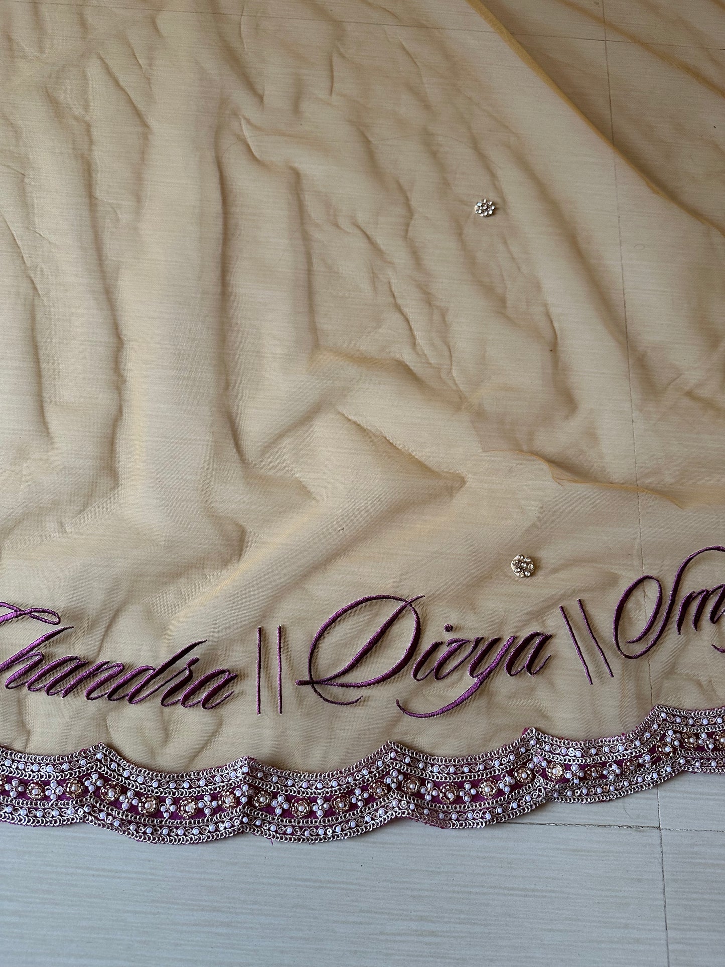 Ancestral Blessings : A Gold Tule veil with multiple personalisations.