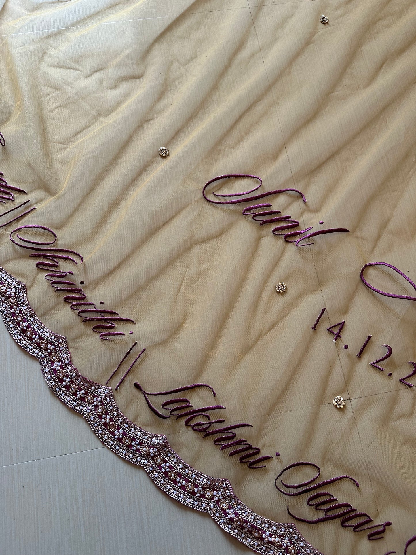 Ancestral Blessings : A Gold Tule veil with multiple personalisations.