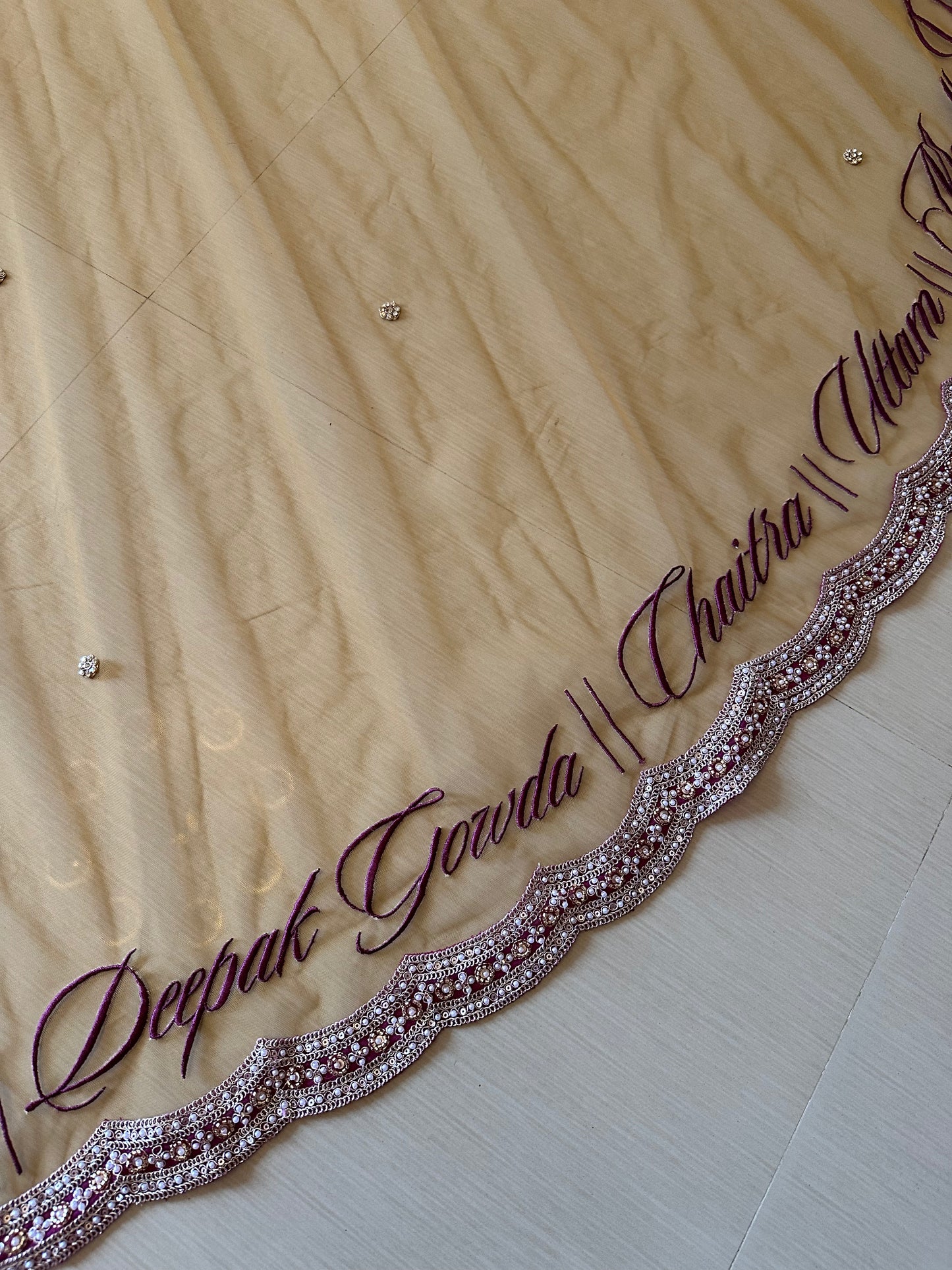 Ancestral Blessings : A Gold Tule veil with multiple personalisations.