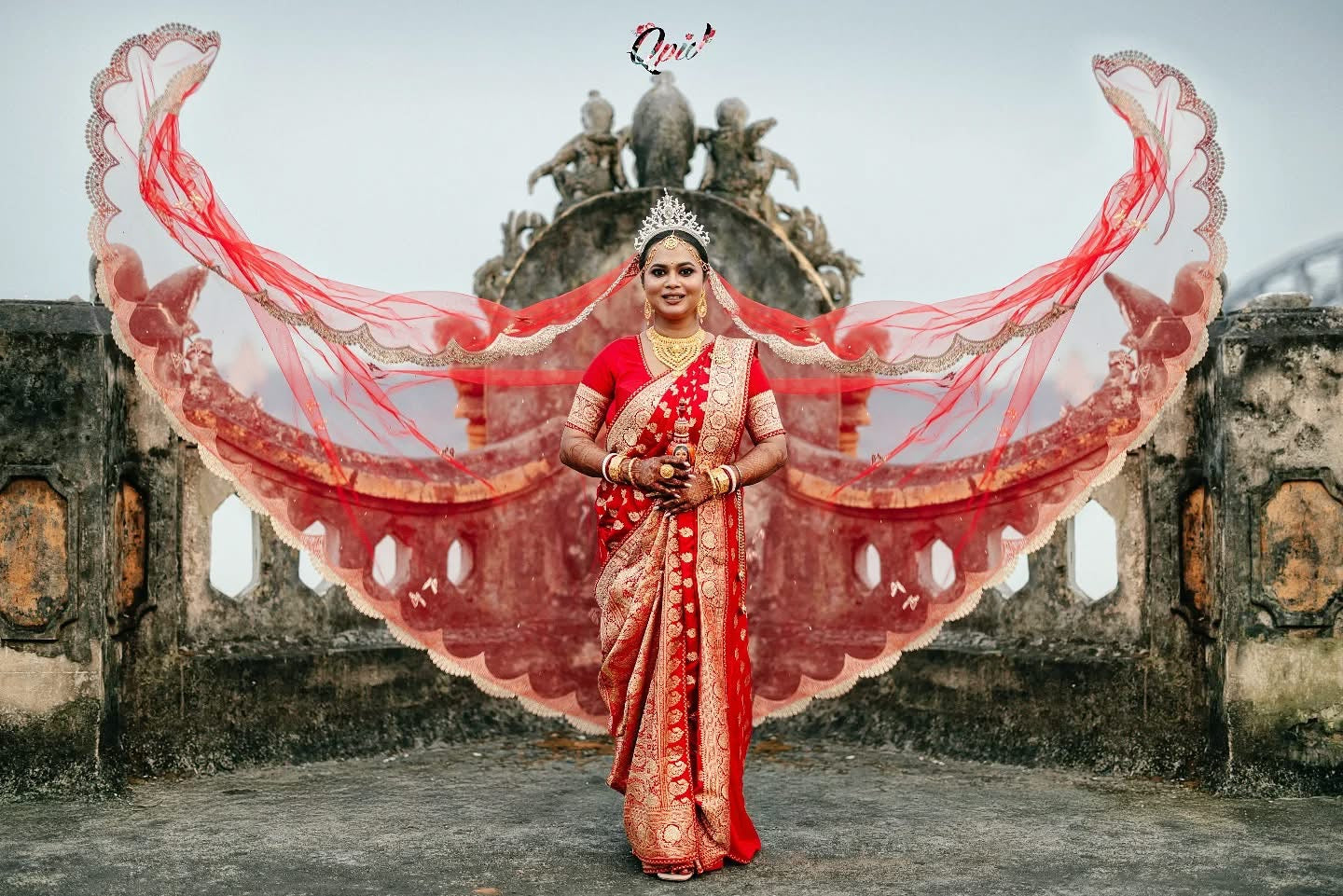 Enchanted Wings : A Red Bridal Veil with Stone-Studded Butterflies