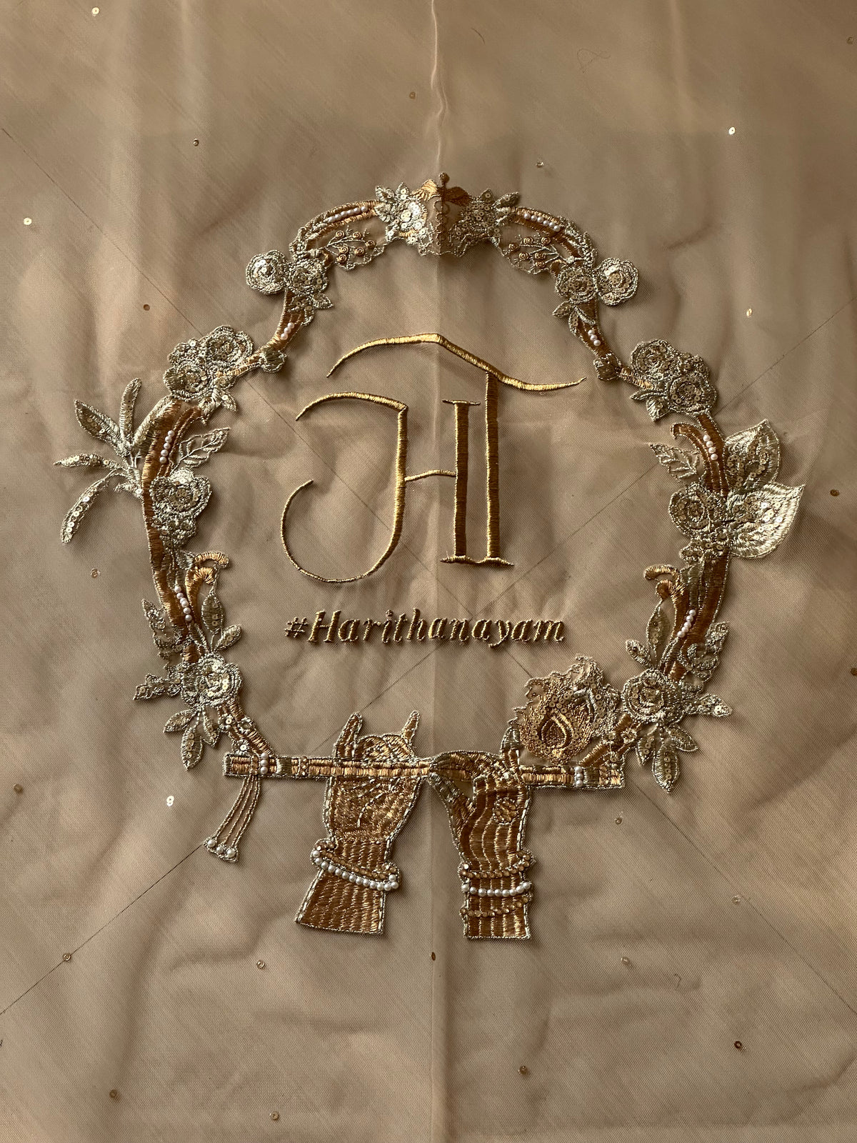 Radhika : Raadha-Krishna inspired Wedding Logo for a Cathedral length Veil