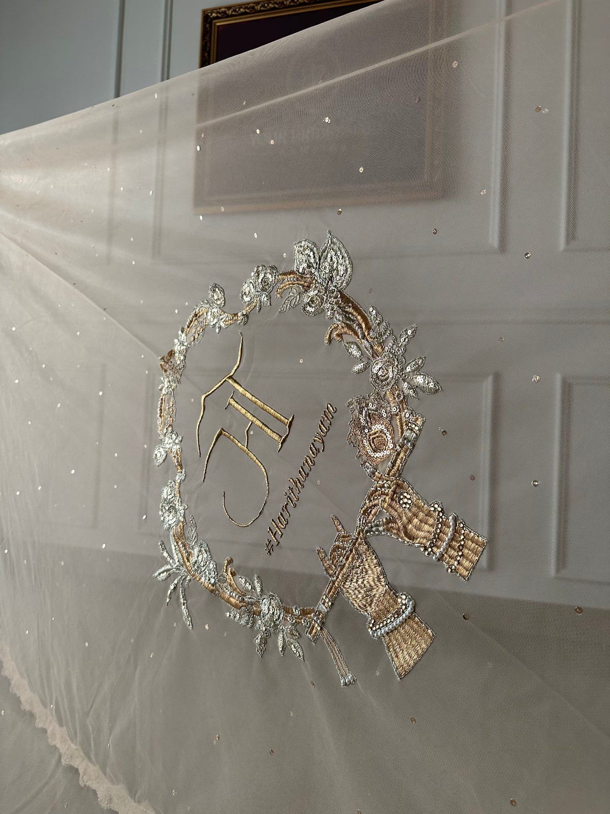 Radhika : Raadha-Krishna inspired Wedding Logo for a Cathedral length Veil