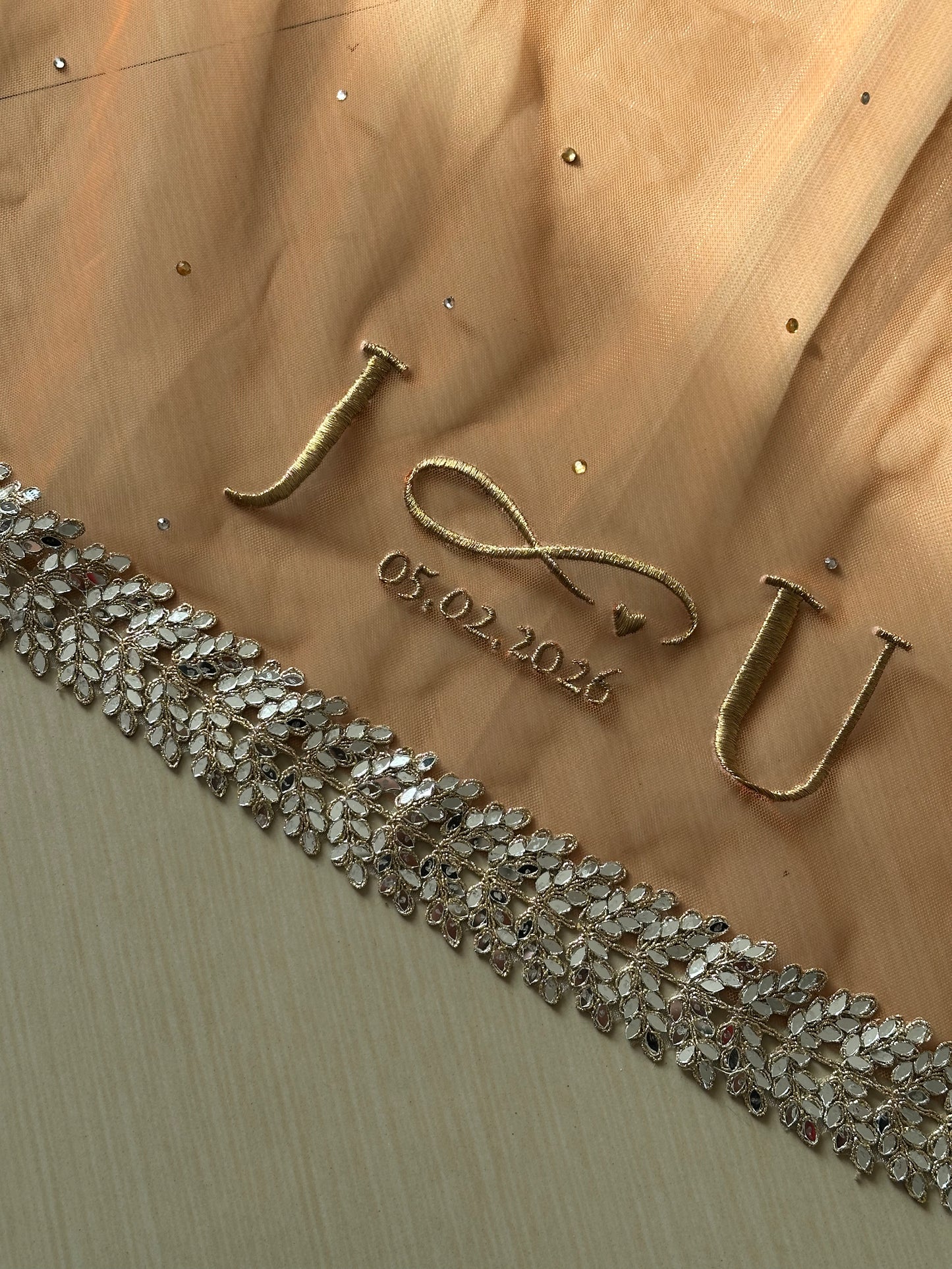 Kesariya : A Coral mirrored Cathedral length Bridal Veil with embroidered personalisations