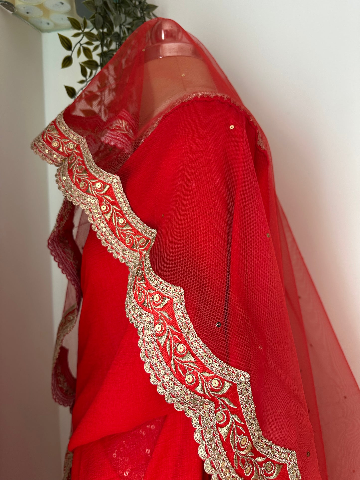 Royal affair : A Sabyasachi-Inspired Red Bridal Veil with Gold Sequins & Handcrafted Motifs