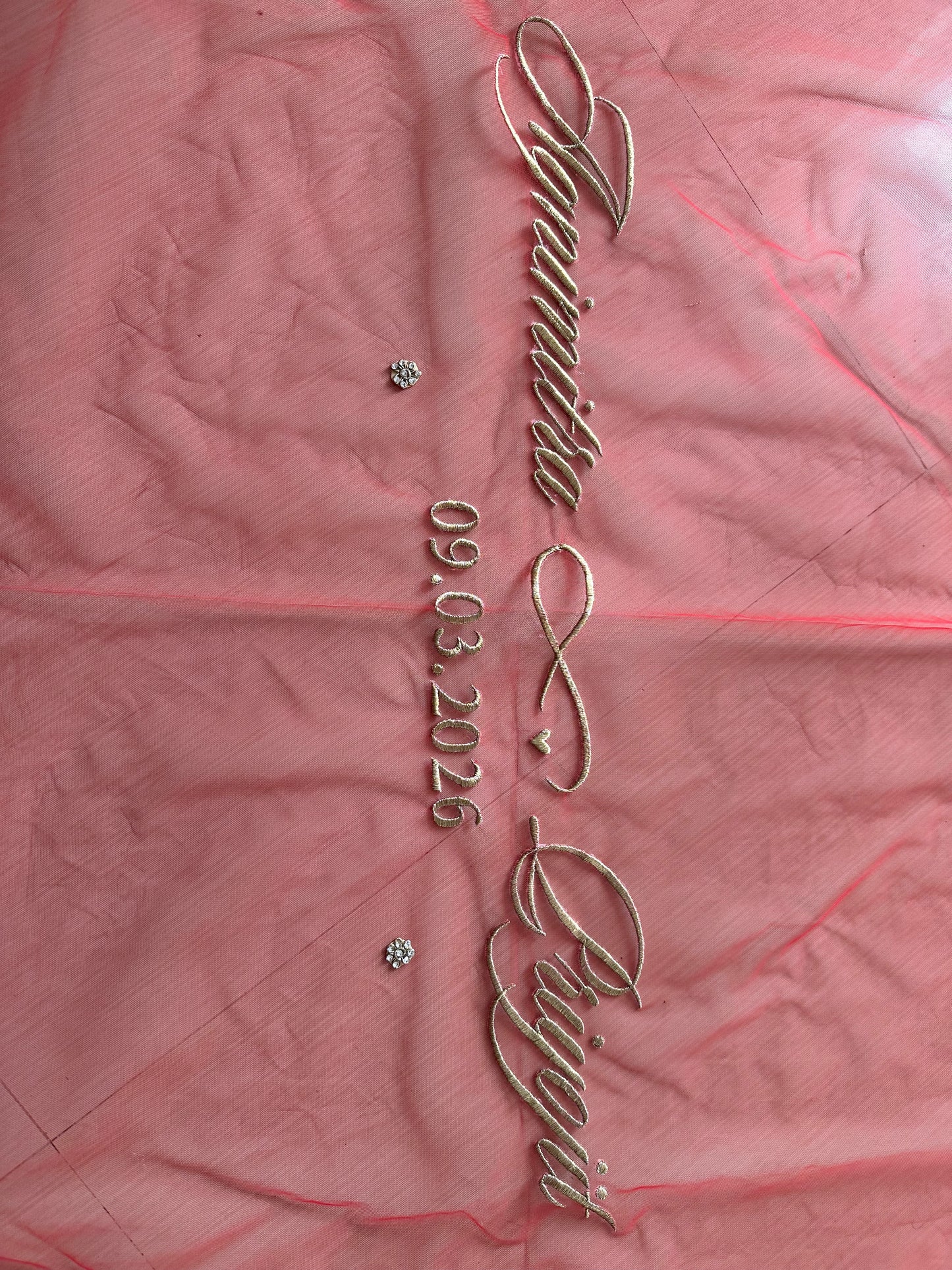 Agni : A Sabyasachi inspired border work with couple's name on cathedral length veil