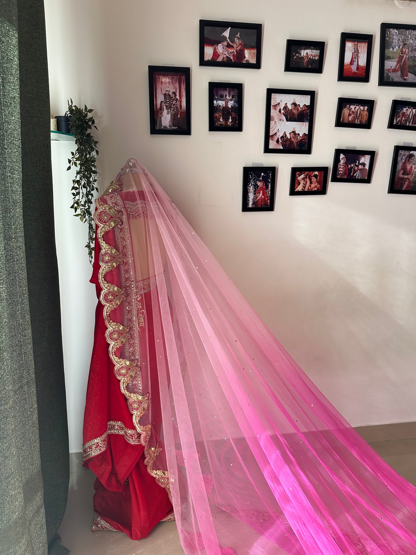 Peonique : A cathedral-length veil in a soft ombré pink, beaded peacock-inspired border