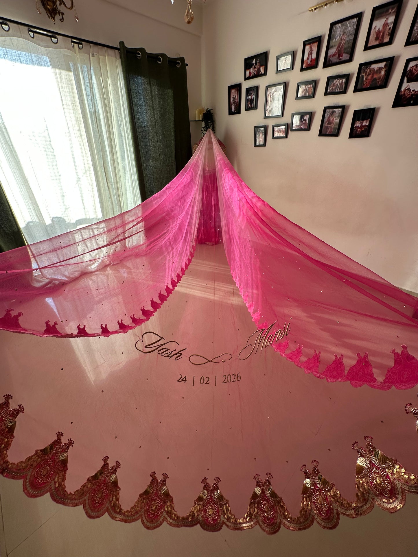 Peonique : A cathedral-length veil in a soft ombré pink, beaded peacock-inspired border