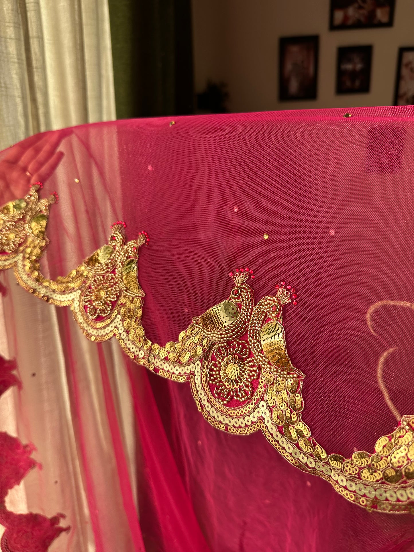 Peonique : A cathedral-length veil in a soft ombré pink, beaded peacock-inspired border