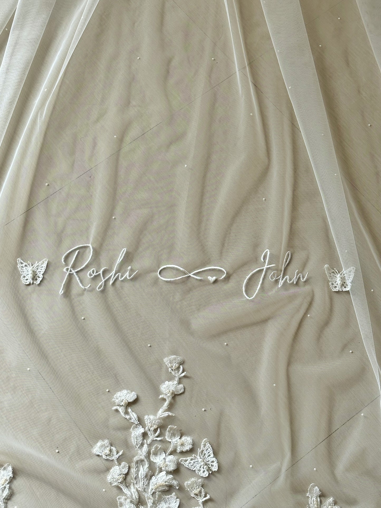 The Love Story Veil : White Cathedral Petal Cut custom hand embroidered floral veil with love story personalisation