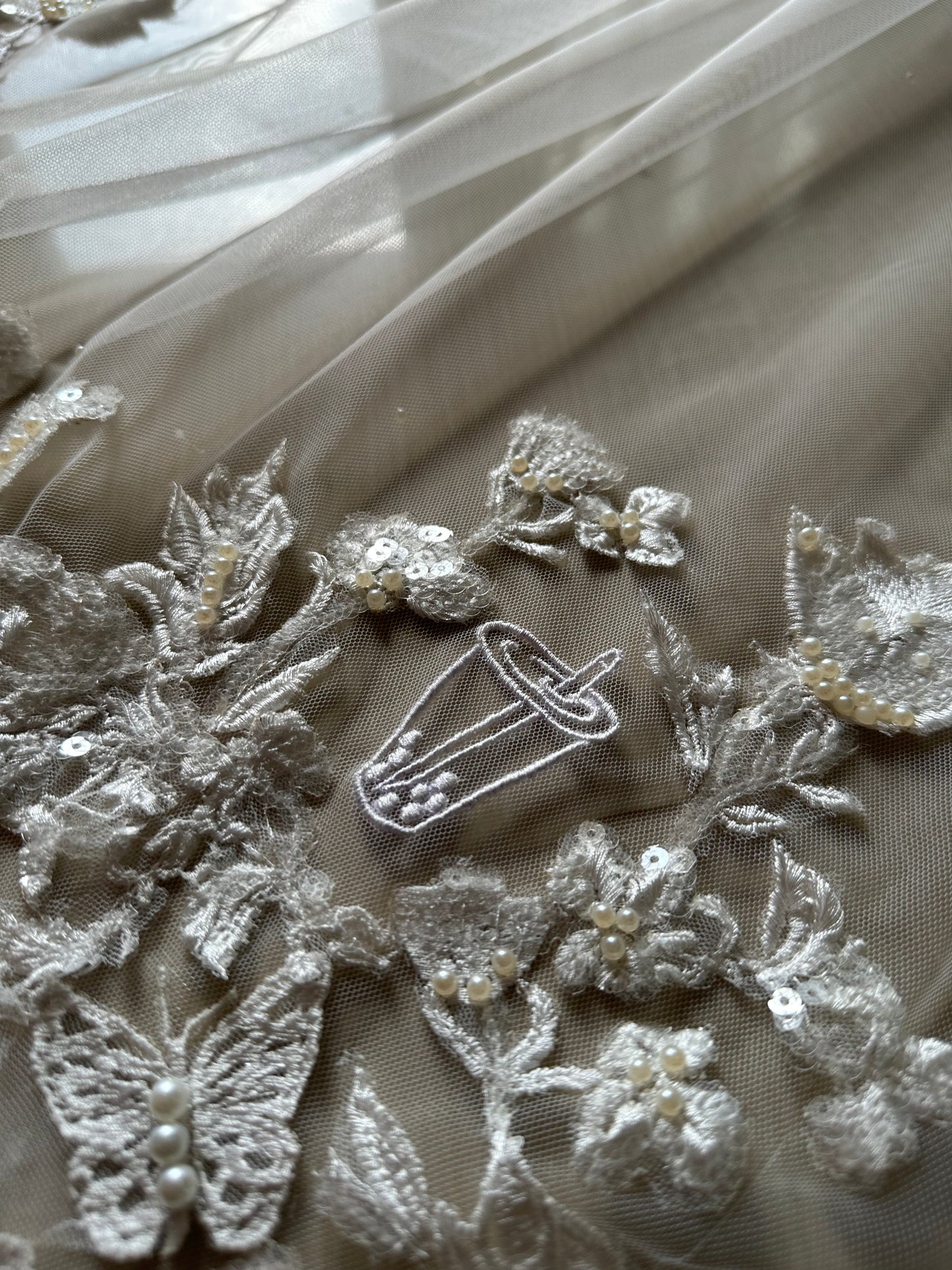 The Love Story Veil : White Cathedral Petal Cut custom hand embroidered floral veil with love story personalisation