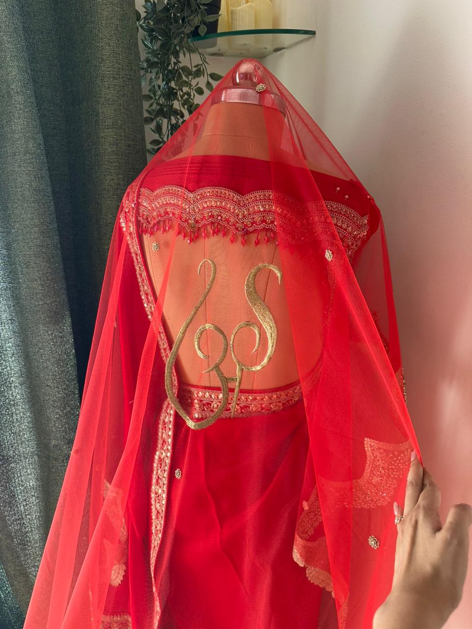 Sarandha :  A Classic Red Veil with Wedding Logo and couple’s name with date
