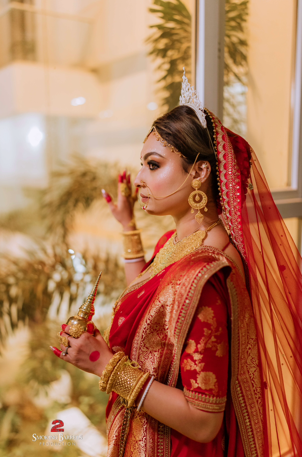 Agni : A Sabyasachi inspired border work with couple's name on cathedral length veil